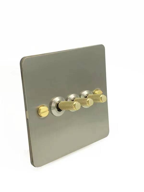 Detailed Silver & Brass Toggle Light Switch - 3 levers