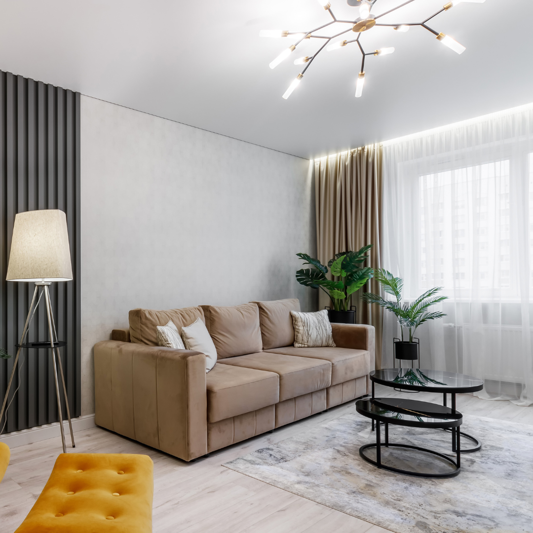 Modern living room with neutral sofa, floor lamp and coffee table